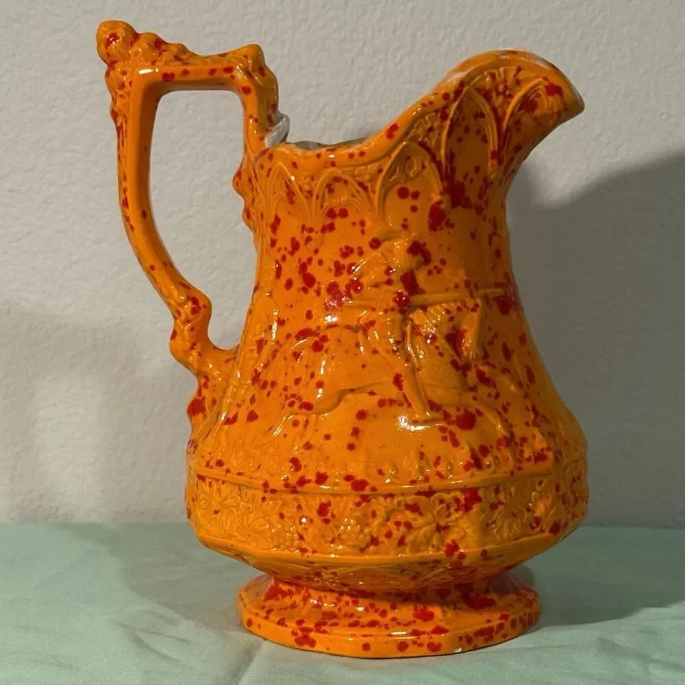 Vintage Medieval design ceramic mold pitcher. Knights jousting. 1979.